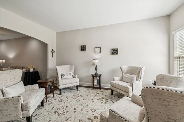 a living room with furniture and a couch