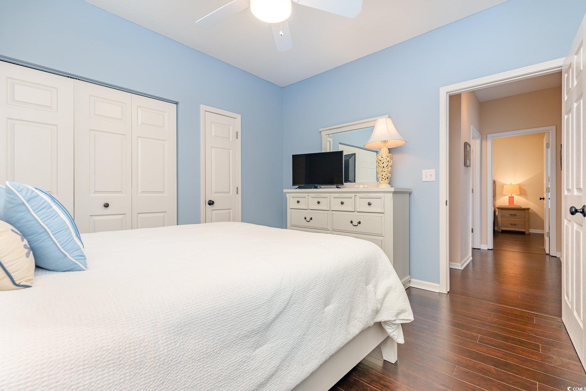 2478 Coastline Court, Unit 202 Murrells Inlet, SC 29576 - Photo 21 of 33 Bedroom featuring dark hardwood / wood-style floor