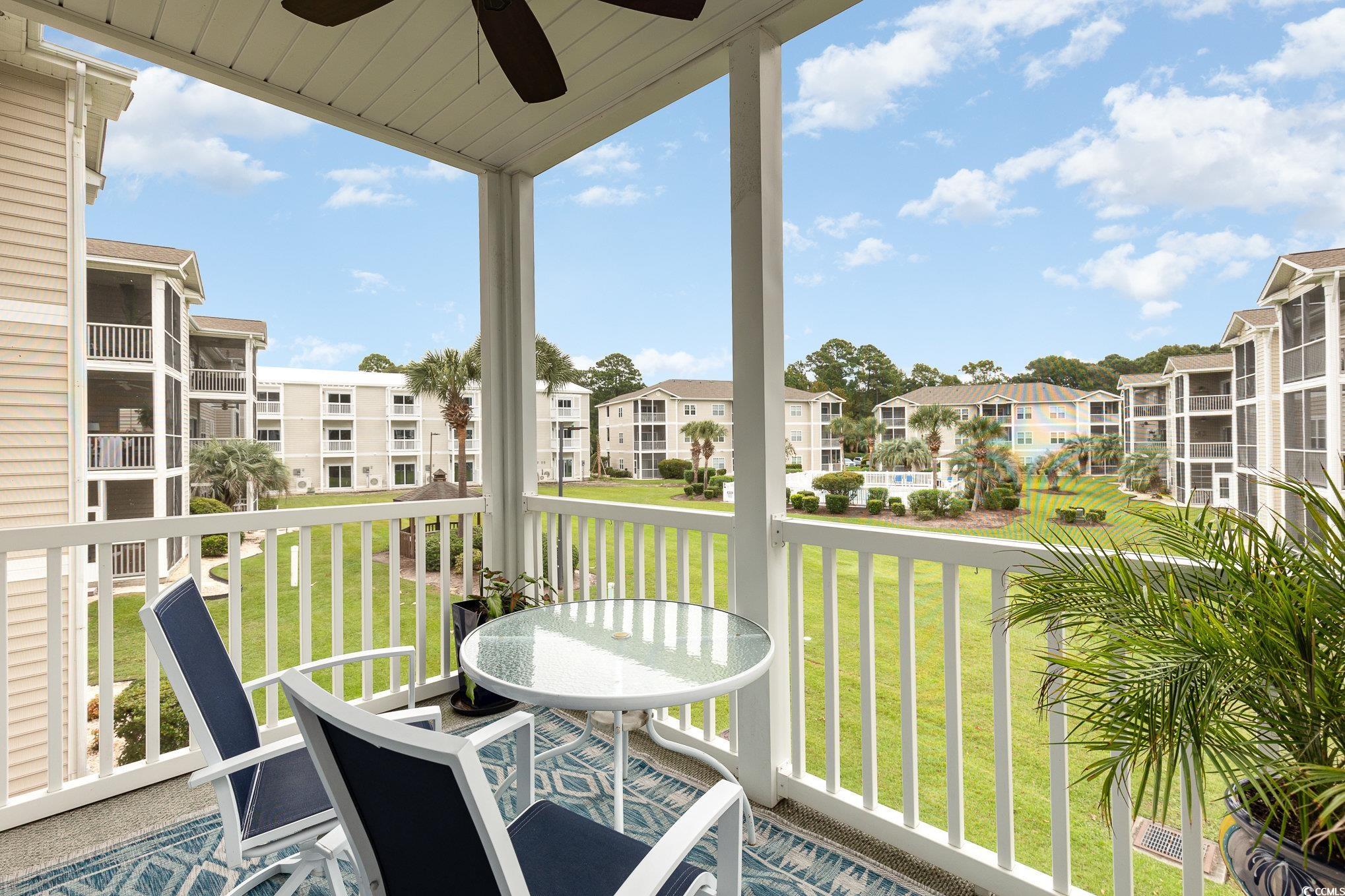 2478 Coastline Court, Unit 202 Murrells Inlet, SC 29576 - Photo 27 of 33 Balcony featuring ceiling fan