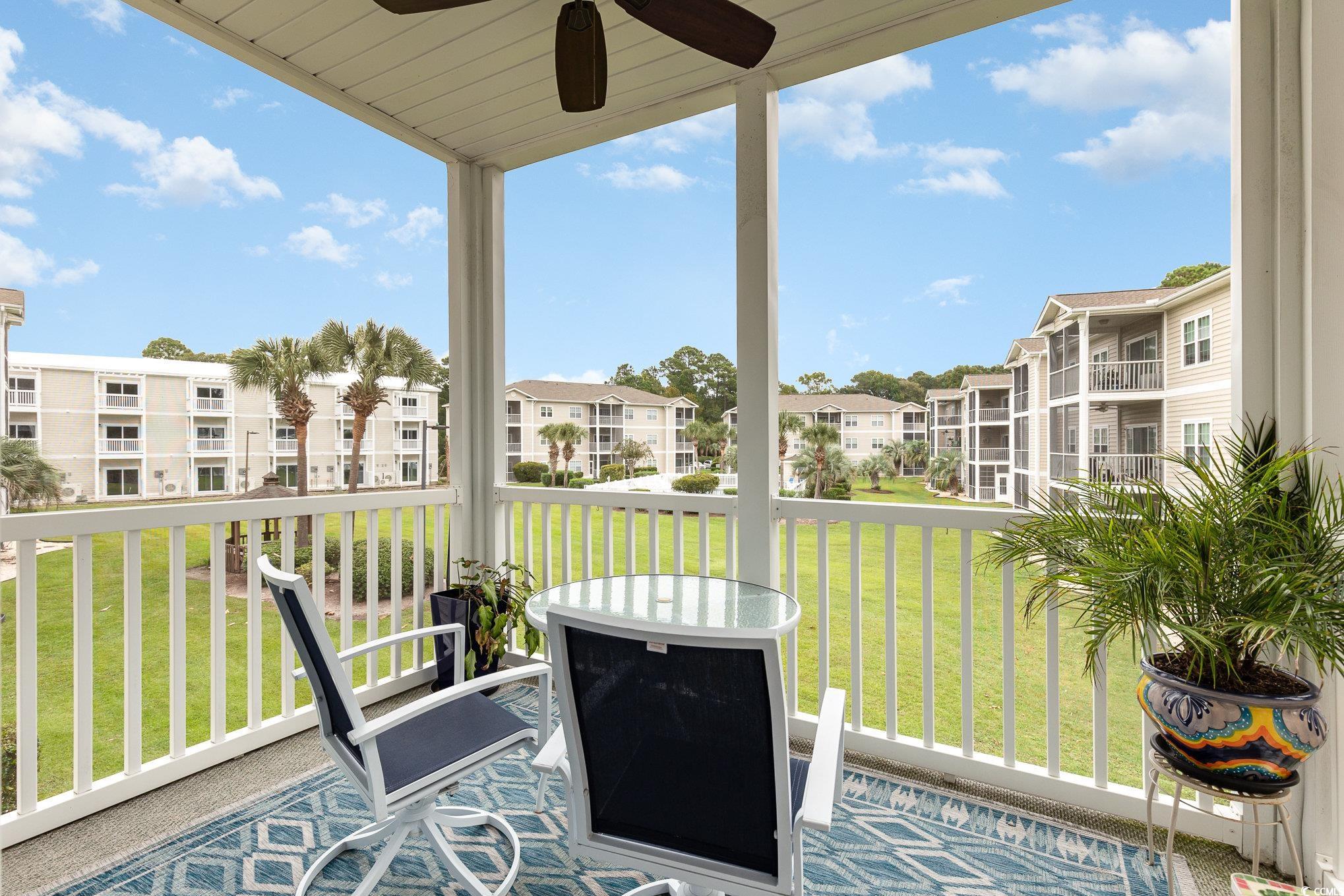 2478 Coastline Court, Unit 202 Murrells Inlet, SC 29576 - Photo 28 of 33 Sunroom / solarium featuring ceiling fan