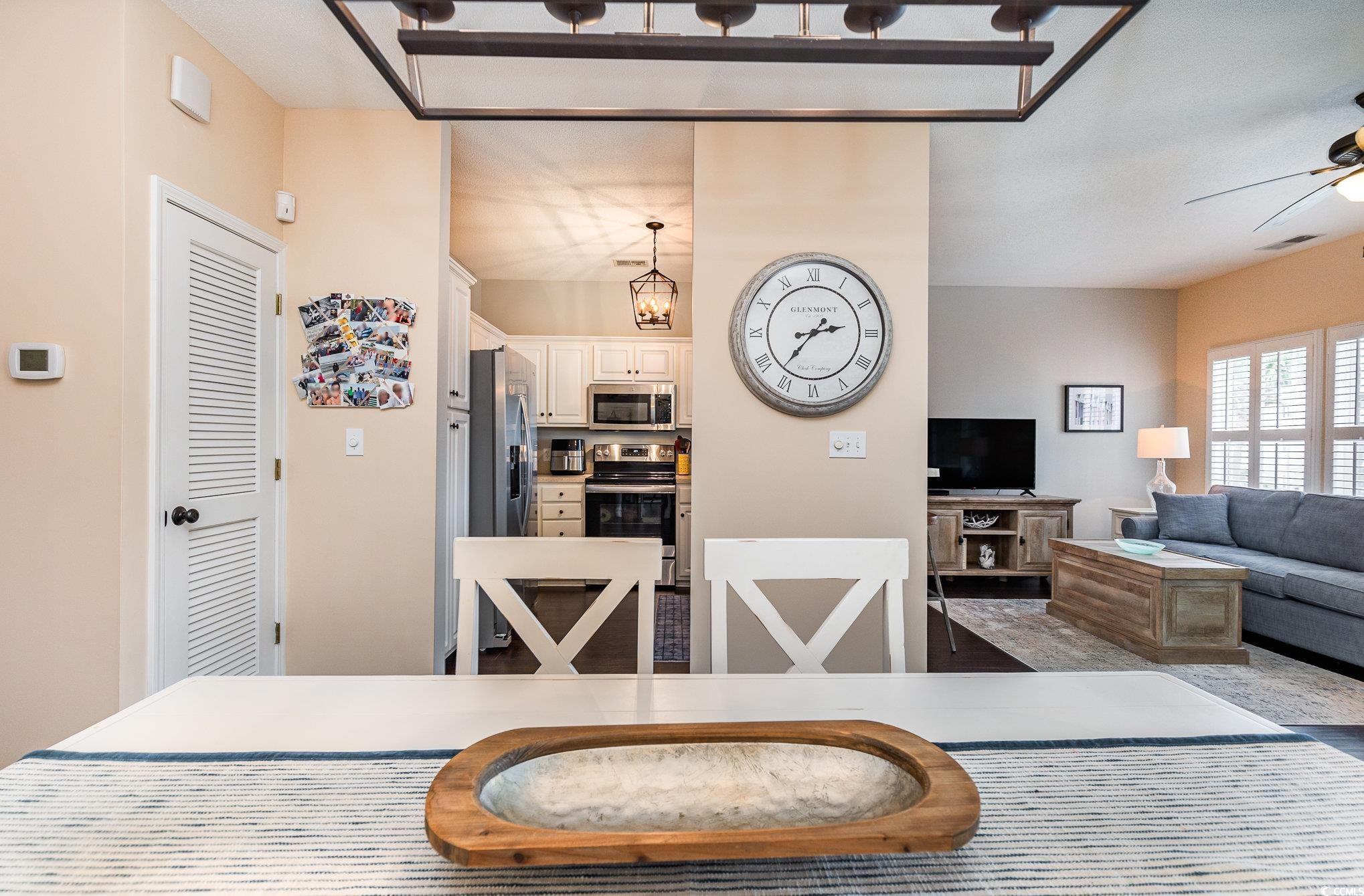 2478 Coastline Court, Unit 202 Murrells Inlet, SC 29576 - Photo 8 of 33 Dining space featuring ceiling fan