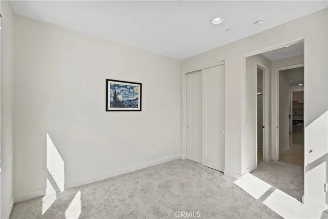 a view of a hallway with closet