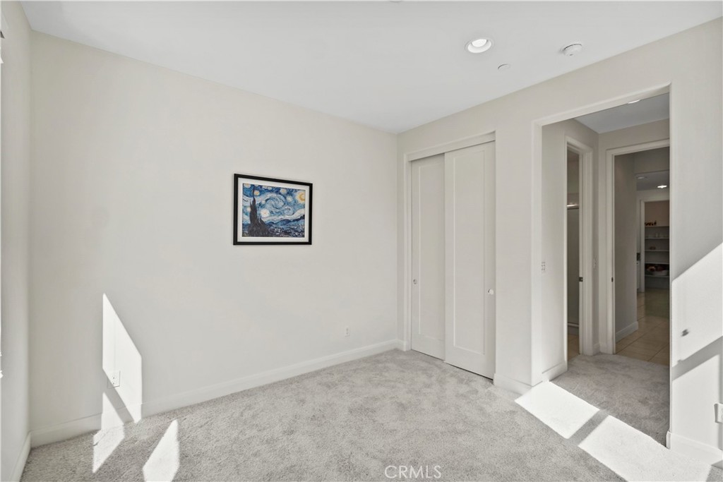 6670 Meadowlane Place Rancho Cucamonga, CA 91701 - Photo 13 of 26 a view of a hallway with closet