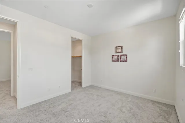 an empty room with a hallway