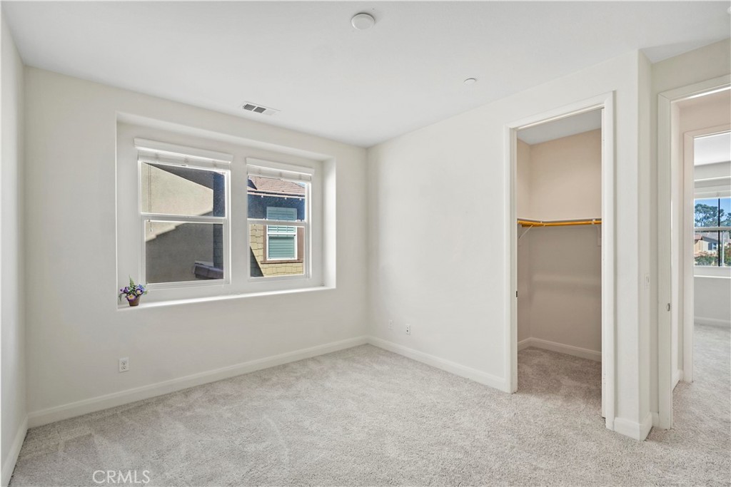 6670 Meadowlane Place Rancho Cucamonga, CA 91701 - Photo 21 of 26 an empty room with a window