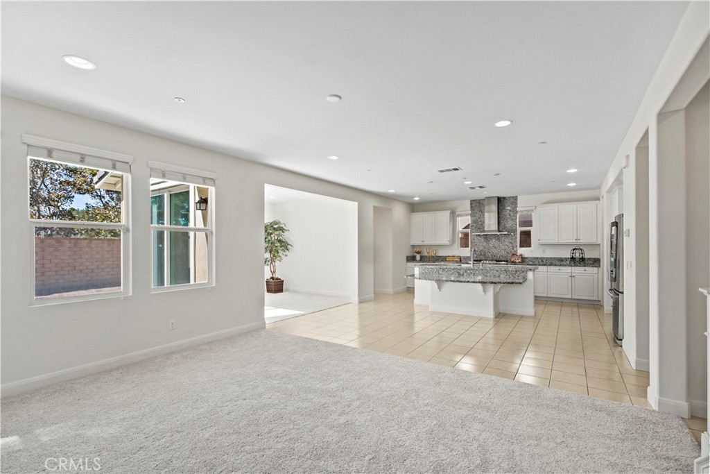 6670 Meadowlane Place Rancho Cucamonga, CA 91701 - Photo 5 of 26 a view of kitchen with kitchen island stainless steel appliances refrigerator oven and cabinets
