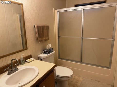 1199 North Terry Street, Unit 139 Eugene, OR 97402 - Photo 15 of 23 a bathroom with a sink toilet and shower