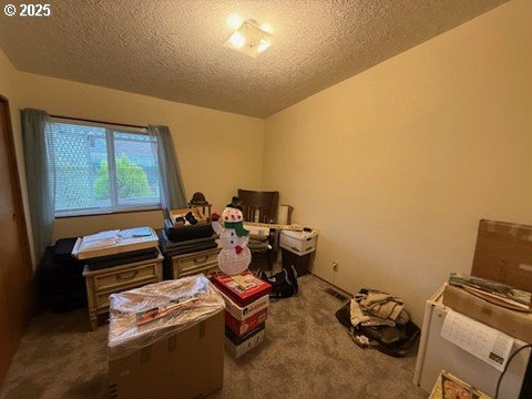 1199 North Terry Street, Unit 139 Eugene, OR 97402 - Photo 16 of 23 a bed room with a bed and a window