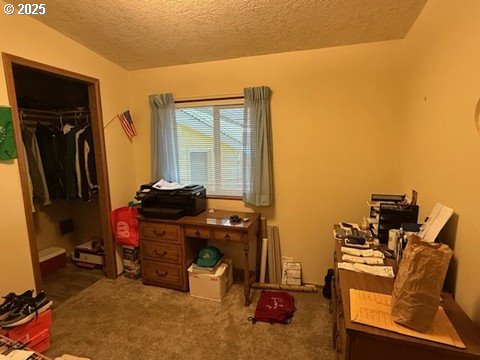 1199 North Terry Street, Unit 139 Eugene, OR 97402 - Photo 17 of 23 a room with furniture and gym equipment