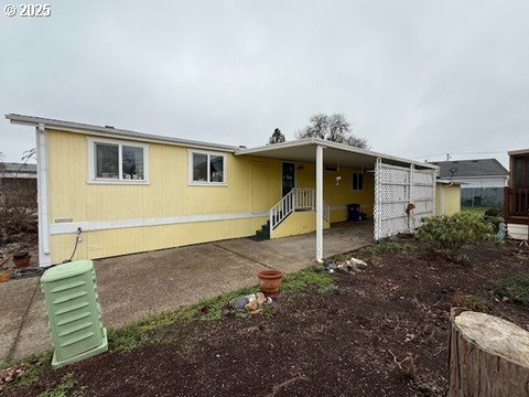 1199 North Terry Street, Unit 139 Eugene, OR 97402 - Photo 2 of 23 a house view with a backyard space