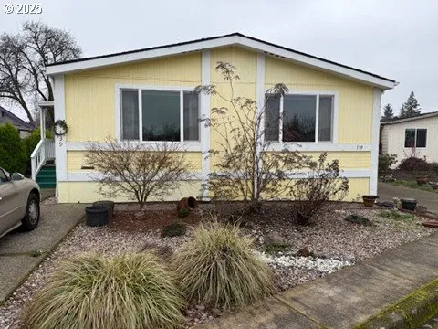 a front view of house with yard