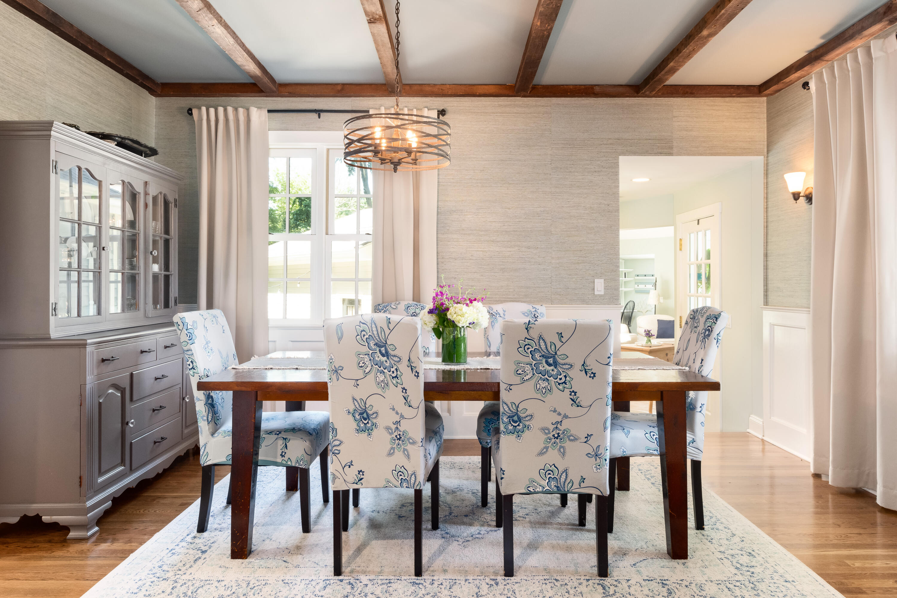91 Hollow Tree Ridge Road Darien, CT 06820 - Photo 8 of 38 a view of a dining room with furniture wooden floor and chandelier