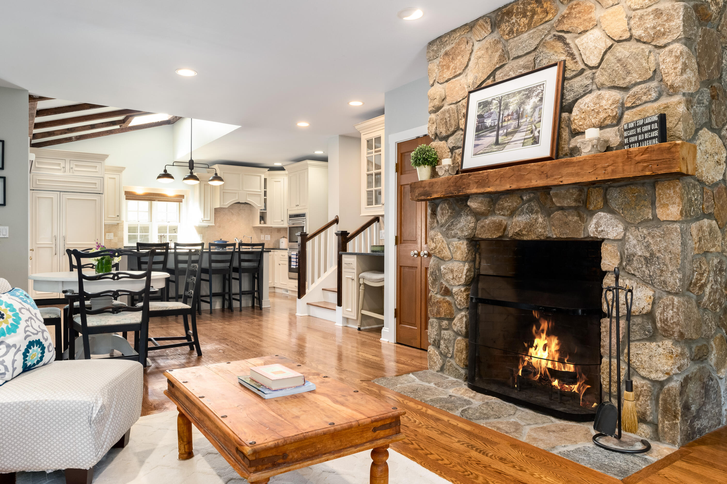 91 Hollow Tree Ridge Road Darien, CT 06820 - Photo 10 of 38 a living room with furniture and a fireplace