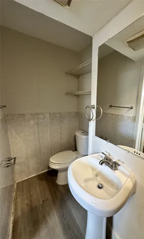 a bathroom with a sink and a toilet