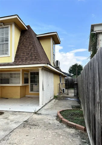 a front view of a house with garage