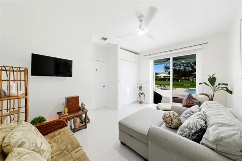 a view of a patio with a dining table and chairs with a patio