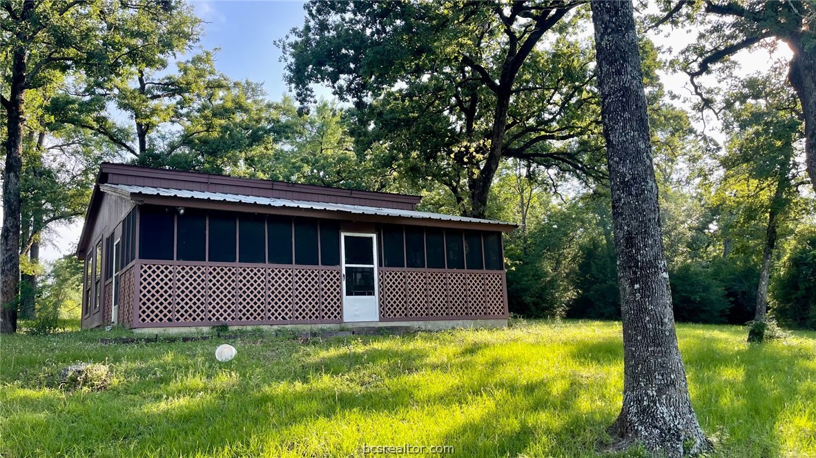 Tbd Tbd Wilson Pasture Road Bryan, TX 77808 - Photo 6 of 29 a front view of a house with a yard