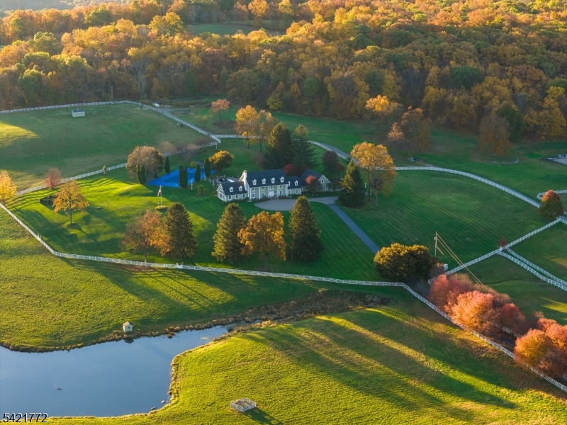 112 Quarry Road Wantage, NJ 07461 - Photo 2 of 24 an aerial view of a golf course with a garden