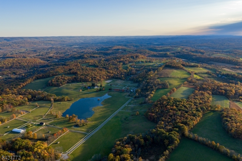 112 Quarry Road Wantage, NJ 07461 - Photo 3 of 24 an aerial view of ocean and residential houses with outdoor space