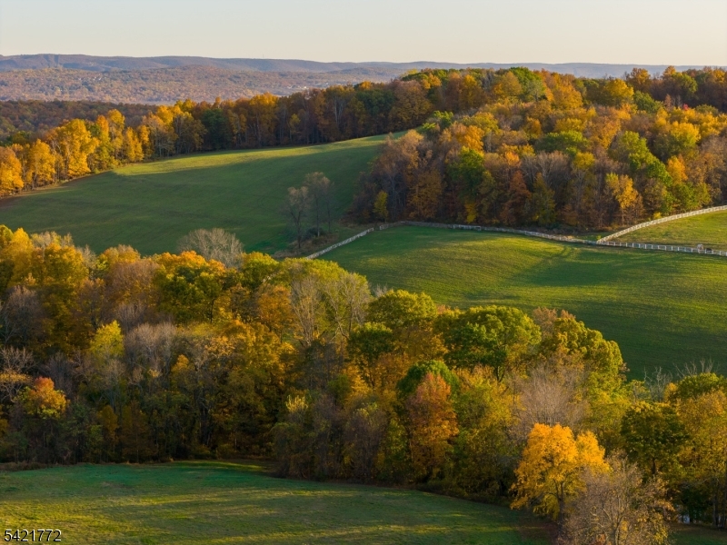 112 Quarry Road Wantage, NJ 07461 - Photo 5 of 24 a view of a golf course with a yard