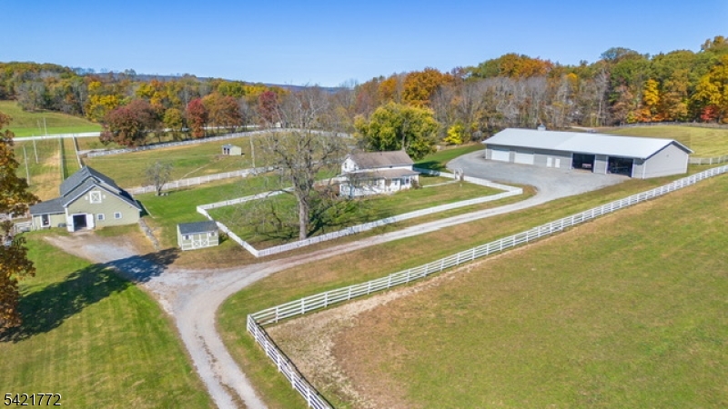 112 Quarry Road Wantage, NJ 07461 - Photo 8 of 26 a view of a swimming pool with a garden