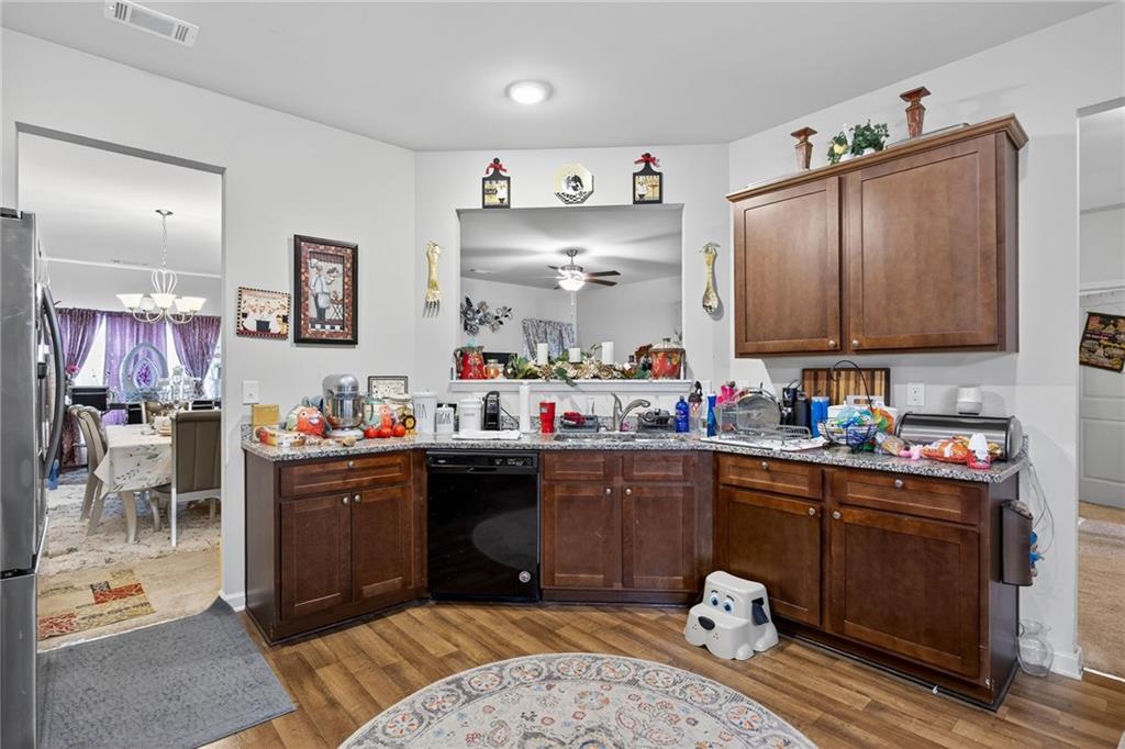 89 Dundee Crossing Dallas, GA 30132 - Photo 12 of 30 a kitchen with sink cabinets and window