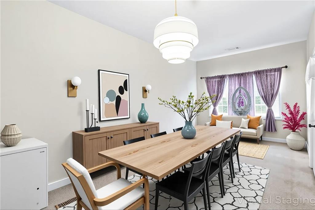89 Dundee Crossing Dallas, GA 30132 - Photo 15 of 30 a view of a dining room with furniture window and wooden floor