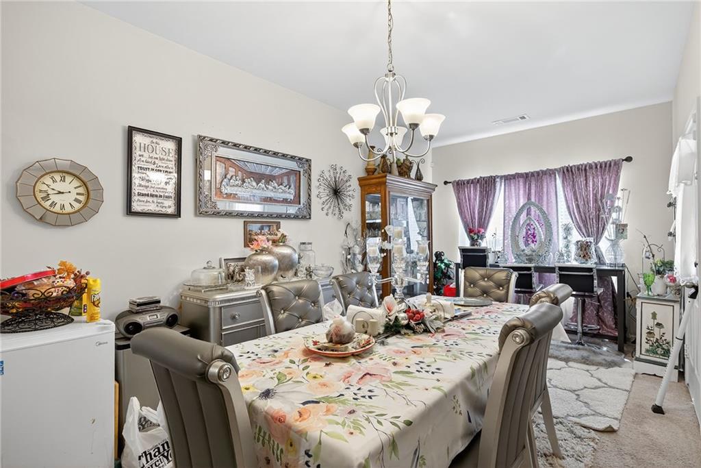 89 Dundee Crossing Dallas, GA 30132 - Photo 16 of 30 a view of a dining room and livingroom view