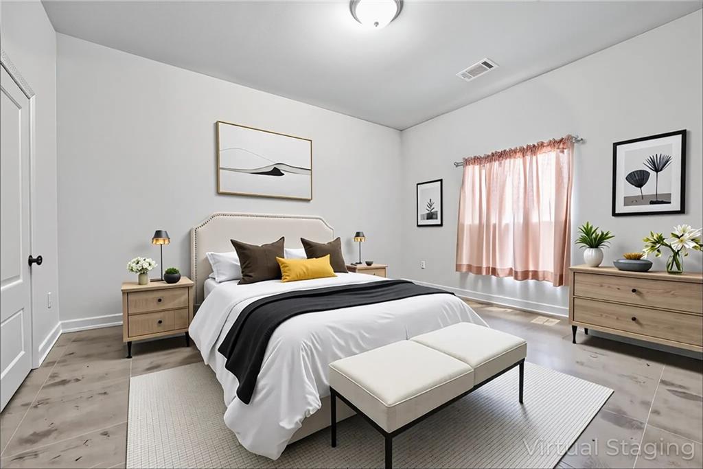 89 Dundee Crossing Dallas, GA 30132 - Photo 21 of 30 a spacious bedroom with a bed and window