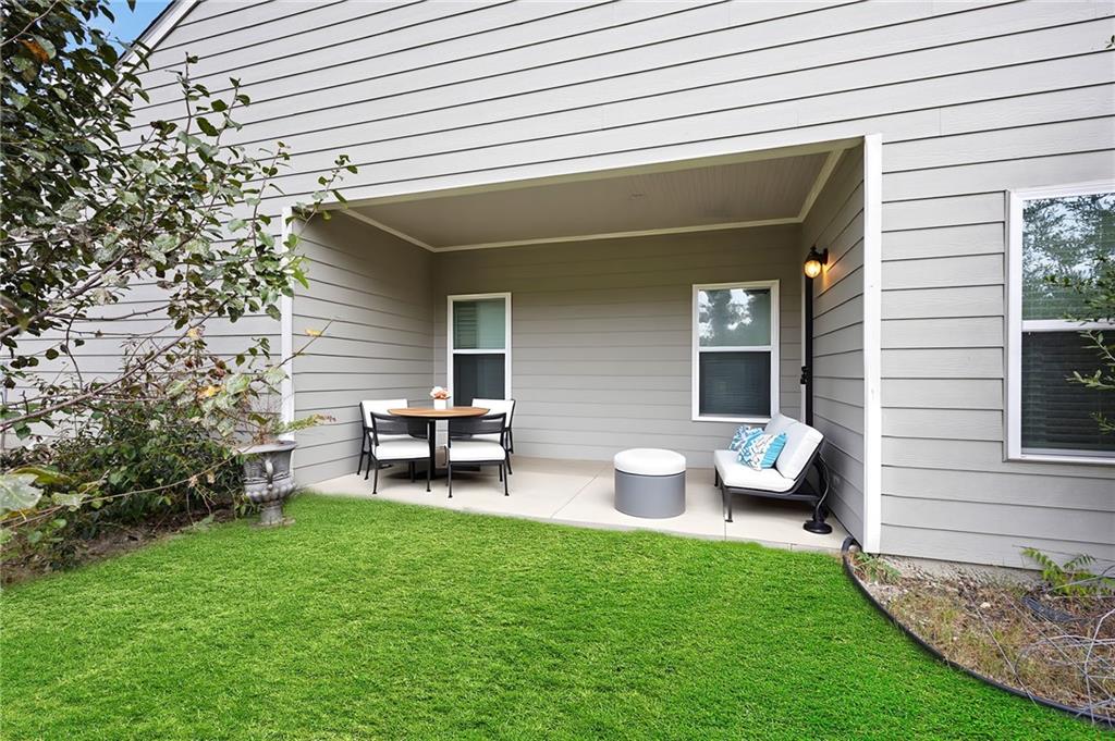 89 Dundee Crossing Dallas, GA 30132 - Photo 27 of 30 a view of a house with patio