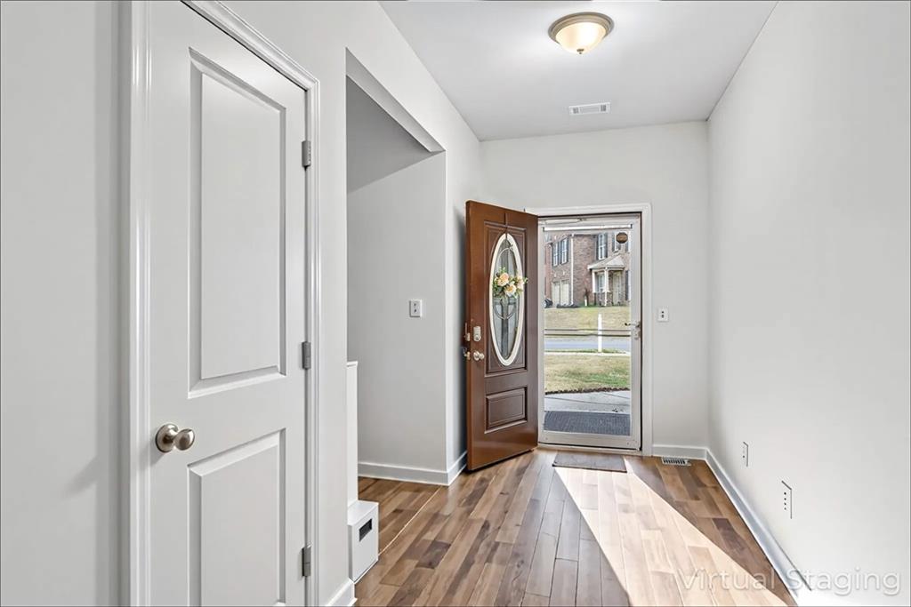 89 Dundee Crossing Dallas, GA 30132 - Photo 4 of 30 a view of hallway with wooden floor