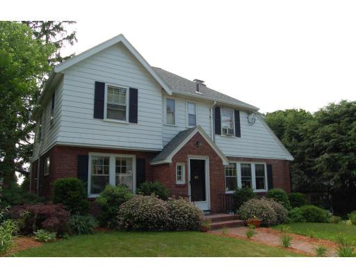 80 Watson Road Belmont, MA 02478 - Photo 2 of 15 a front view of a house with garden