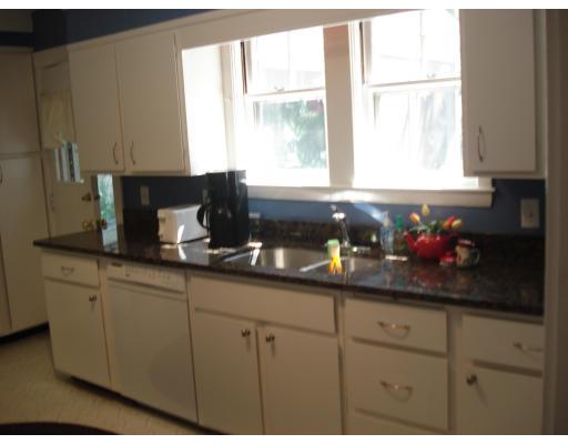 80 Watson Road Belmont, MA 02478 - Photo 8 of 15 a kitchen with white cabinets and window