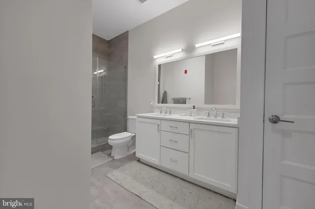 a living room with furniture a large window