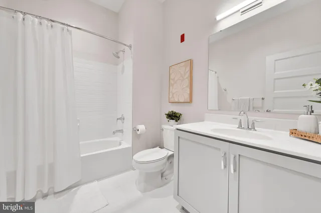 a roof deck view with a seating space