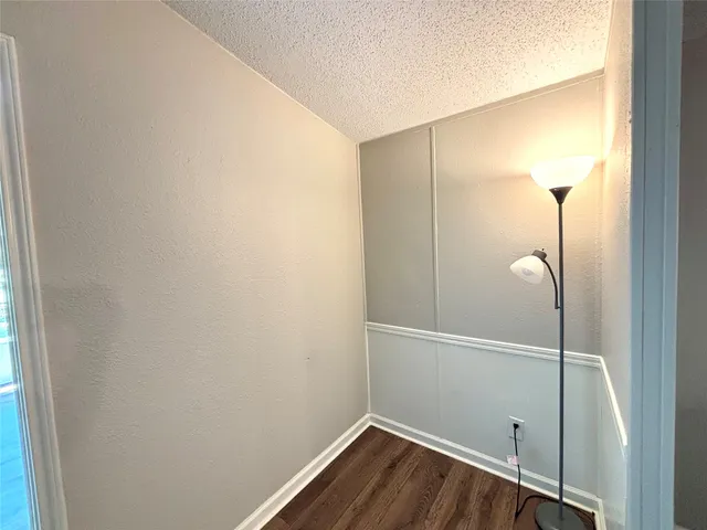 a view of small space with wooden floor