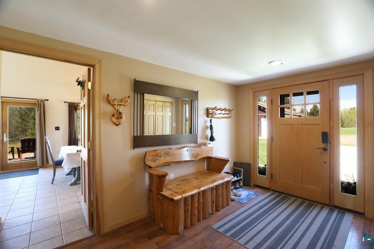 10362 Arkola Road Meadowlands, MN 55765 - Photo 12 of 30 Entrance foyer featuring plenty of natural light, wood finished floors, and baseboards