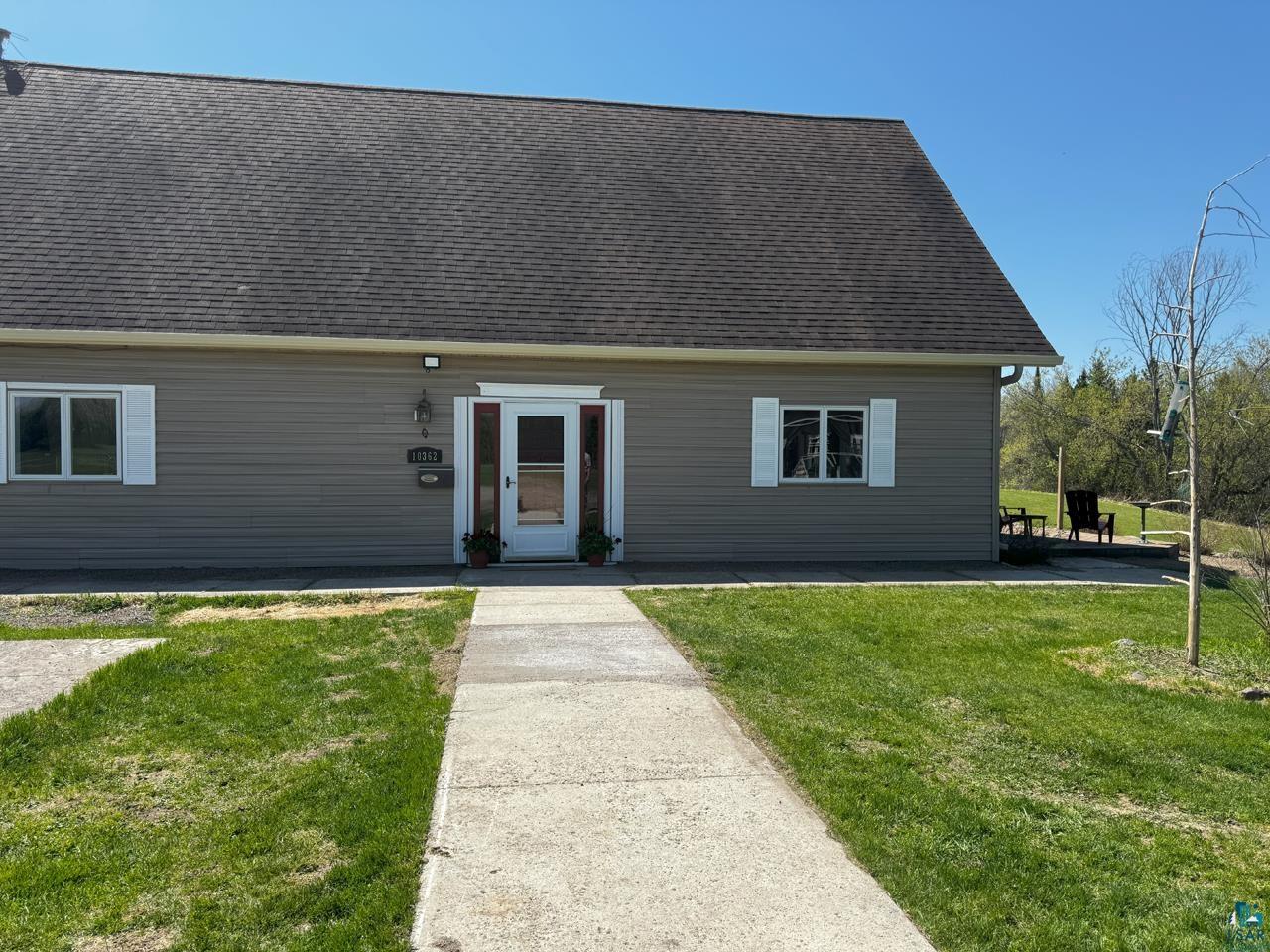 10362 Arkola Road Meadowlands, MN 55765 - Photo 22 of 30 View of front facade featuring a front lawn