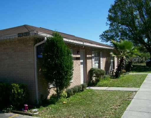 1030 Gay Road Lakeland, FL 33811 - Photo 1 of 1 front view of a house with a yard