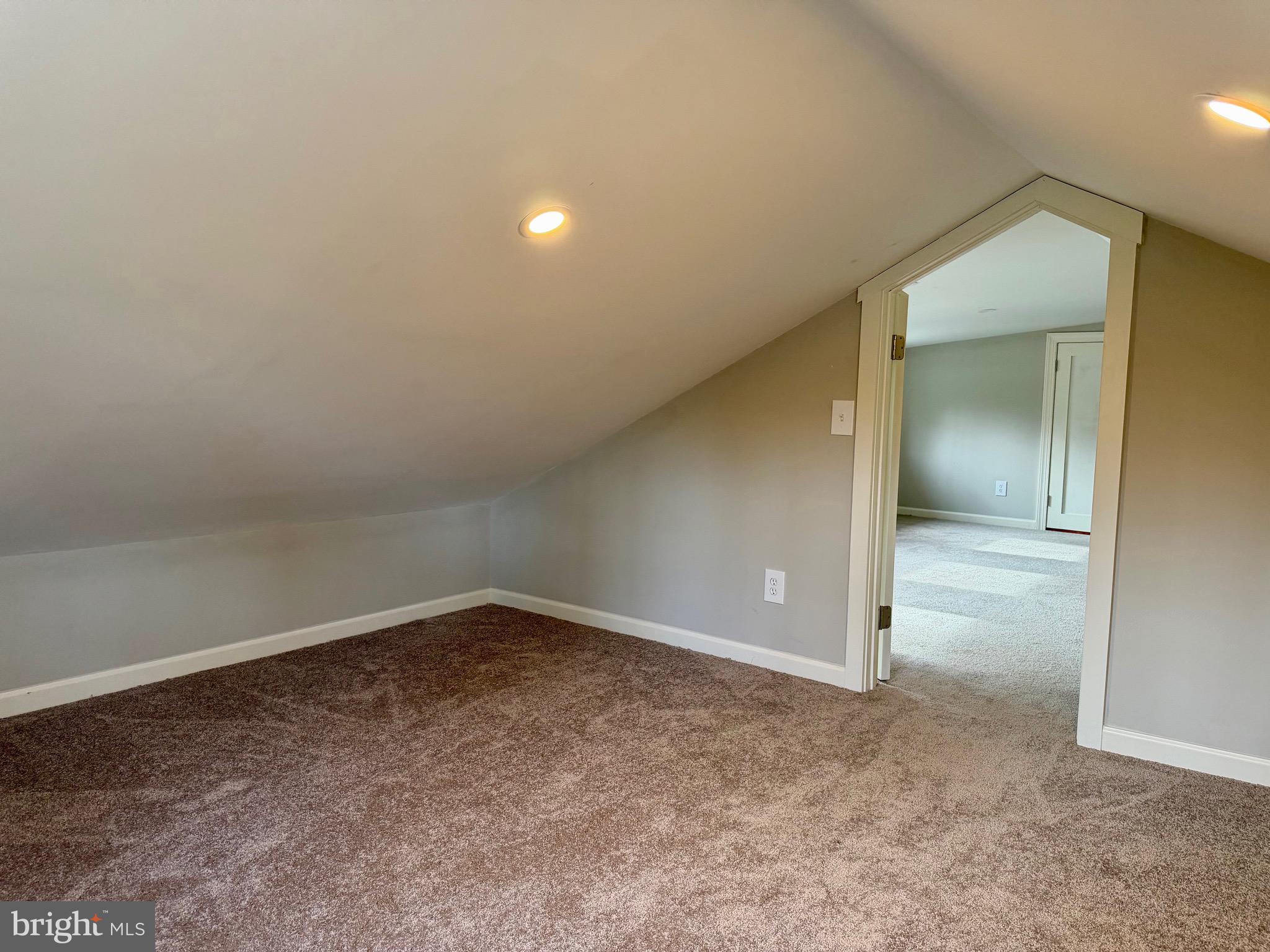 1176 Stokes Road Medford, NJ 08055 - Photo 21 of 27 an empty room with closet and mirror
