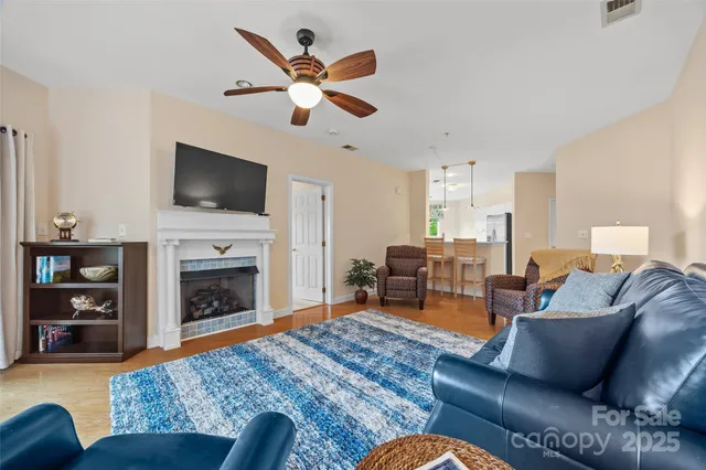 a living room with furniture or fireplace and a flat screen tv