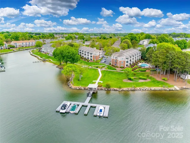 a view of a balcony with chairs