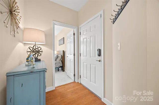 a view of hallway with livingroom and hallway