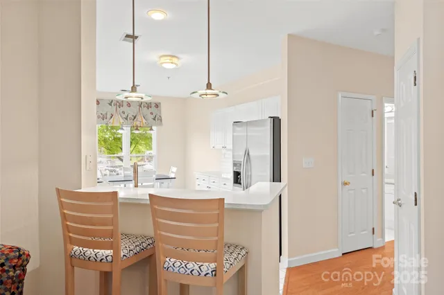 a bathroom with a sink a mirror and a bathtub