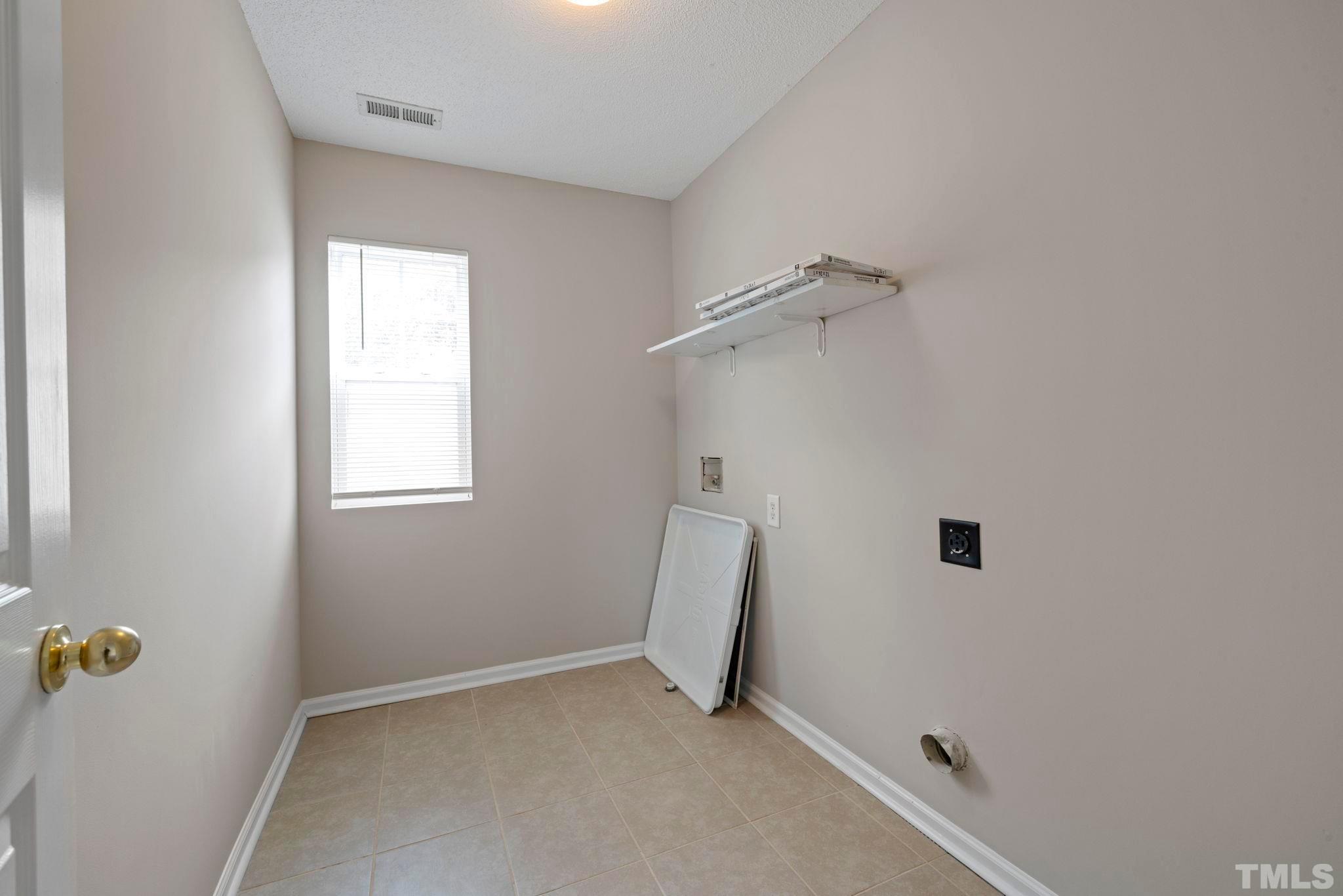 3519 Mountain Brook Circle Durham, NC 27704 - Photo 17 of 24 an empty room with a window