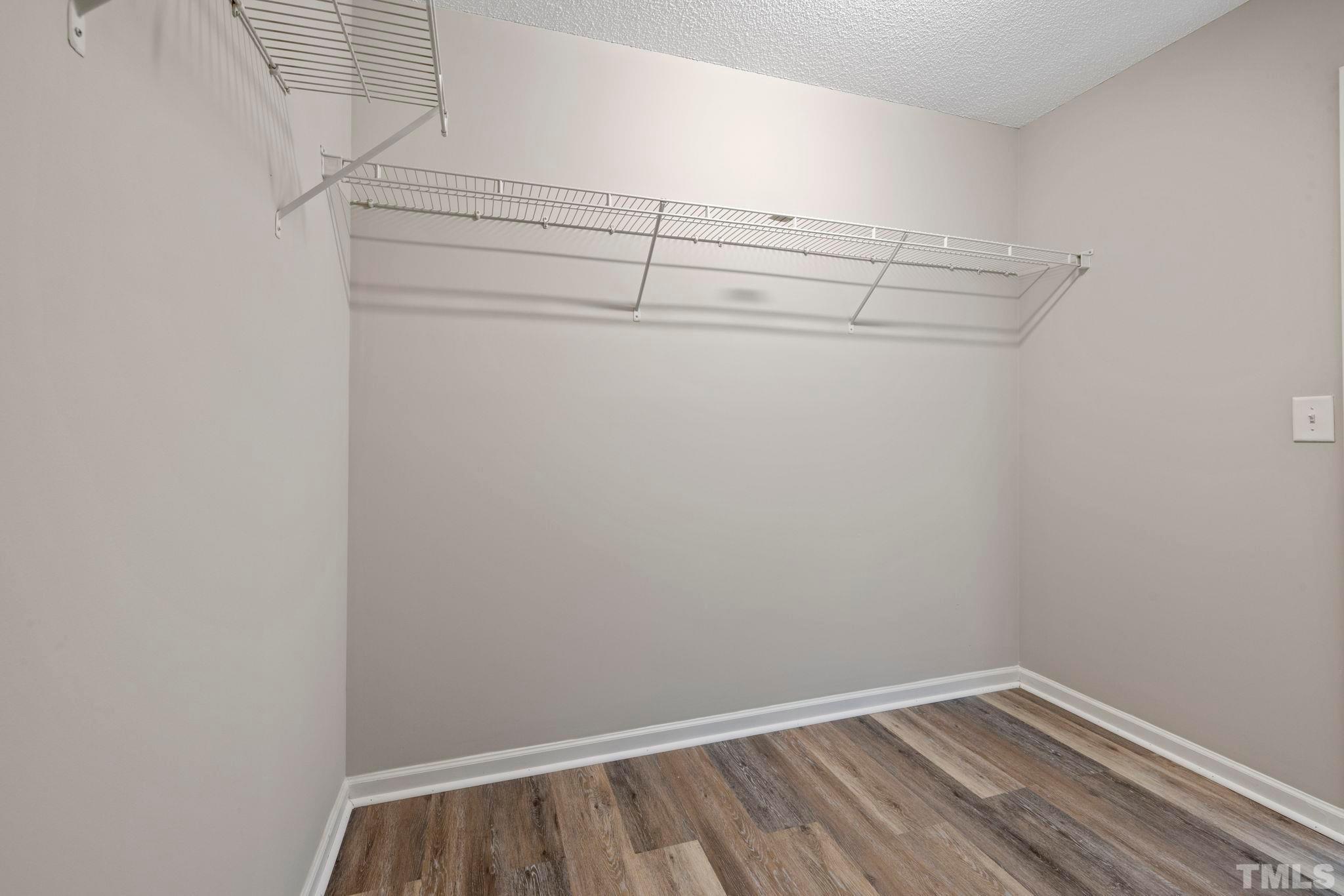 3519 Mountain Brook Circle Durham, NC 27704 - Photo 18 of 24 a view of a room with racks on the wall