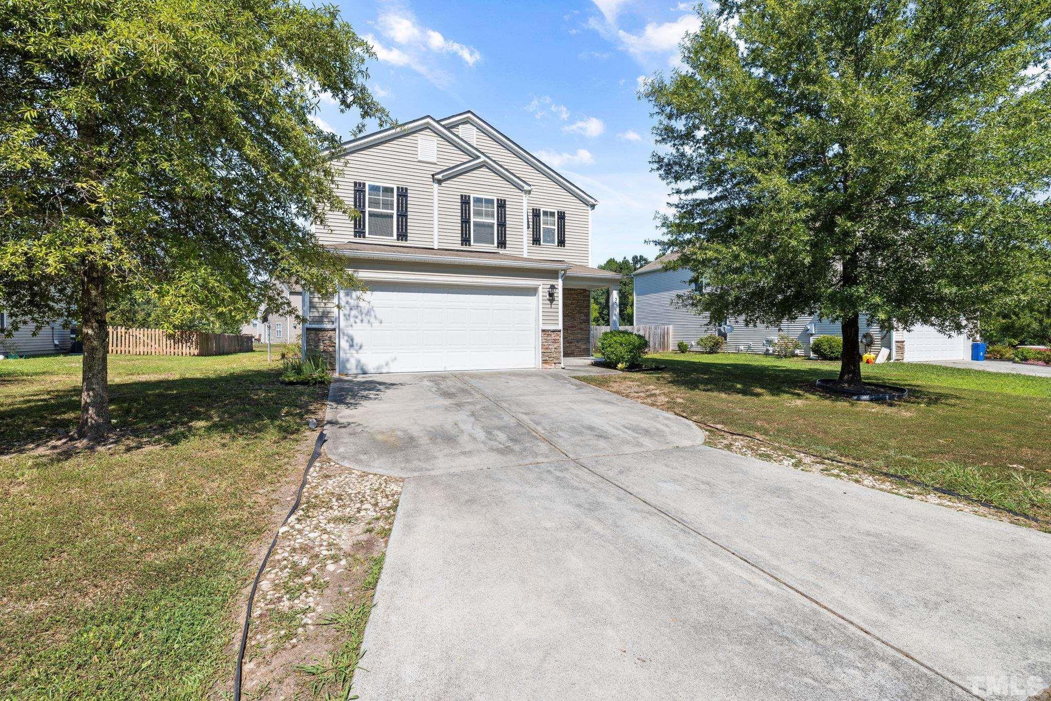 3519 Mountain Brook Circle Durham, NC 27704 - Photo 2 of 24 front view of a house with a yard