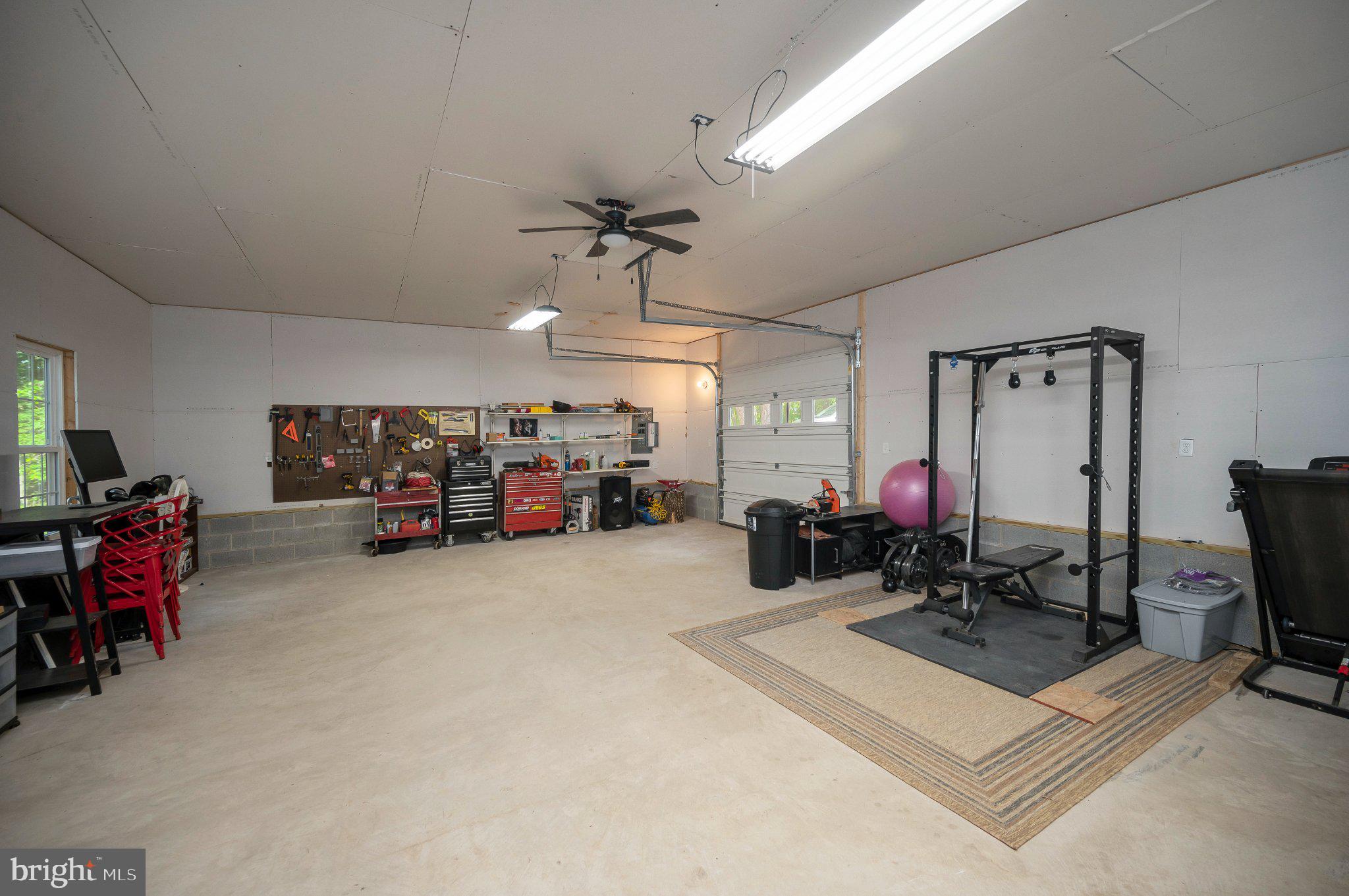 28282 Tatum Road Unionville, VA 22567 - Photo 36 of 52 Spacious garage with workout area.