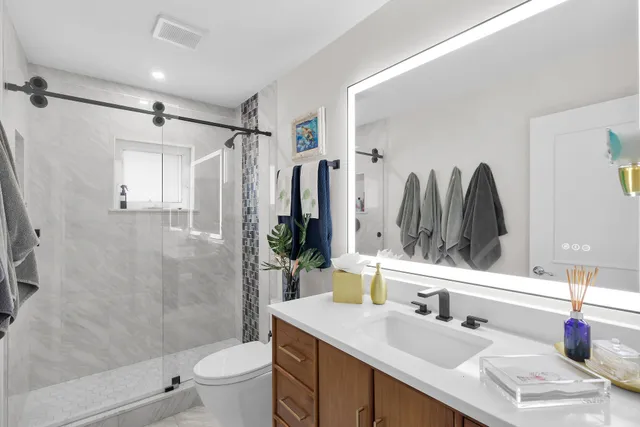a view of a porch with wooden floor and a window