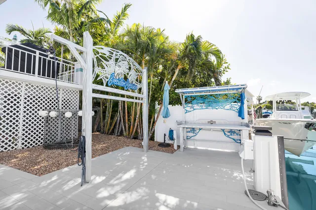 a view of a livingroom with a furniture and windows